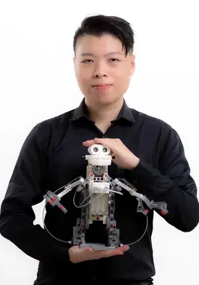 Advaspire robotics trainer, Kenyon with robot monkey