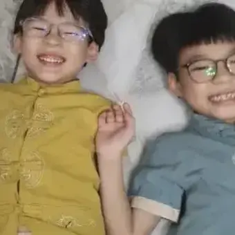 A mom and her 2 little happy boys giving Advaspire review from WhatsApp