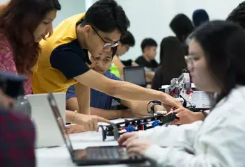 leader leading team to build and code lego robot system at University Nottingham