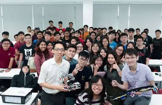 university Nottingham chemical engineering students smile happily in Advaspire robotics class